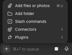 תפריט עם חמש שורות: Add files or photos, Add folder, Slash commands, Connectors ו־Plugins, ומתחתיו תיבת הכתיבה